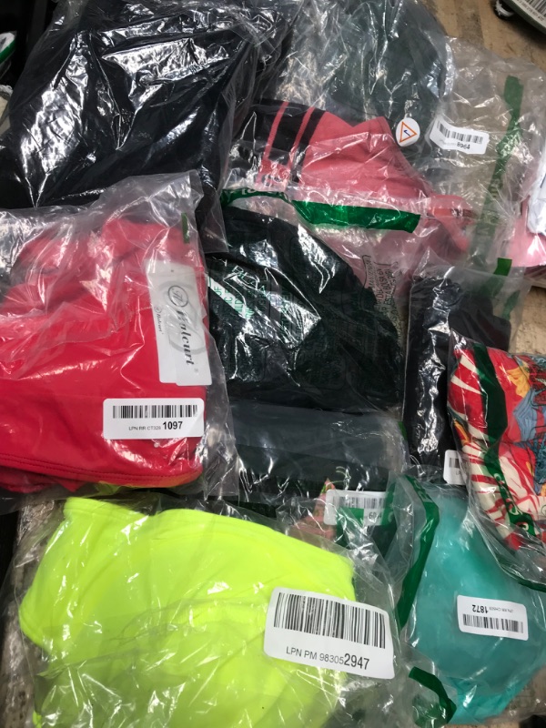 Photo 1 of Bundle of Miscellaneous types of woman sports wear. 