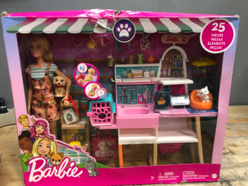 Photo 2 of Barbie Doll and Playset, Pet Boutique with 4 Pets, Color-Change Grooming Feature and 20+ Themed Accessories