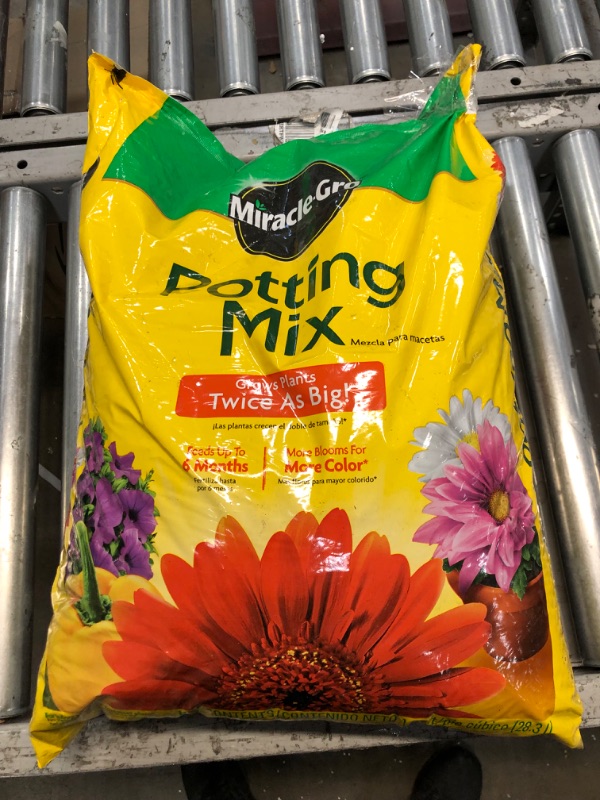 Photo 1 of **OPENED**Miracle-Gro Potting Mix 1 Cu. Ft. for Use with Container Plants
