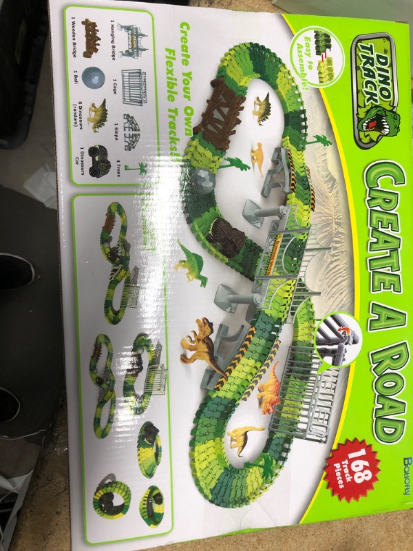 Photo 2 of Batlofty Dinosaur Toys Race Track, Flexible Track Playset, Create A Dinosaur World Road Race with 1 Dinosaur Car and 6 Dinosaur Toys for 3 4 5 6 7 Year Old Boys Girls Birthday Gifts Dinosaur Race Track