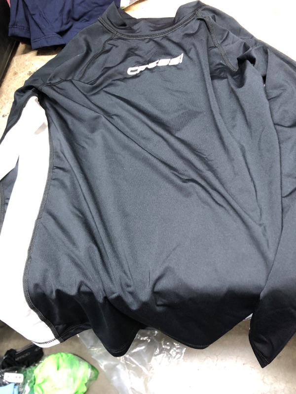 Photo 1 of **USED**  Bundle of 4 Shirts/Tops- Varying sizes and kids sizes/colors