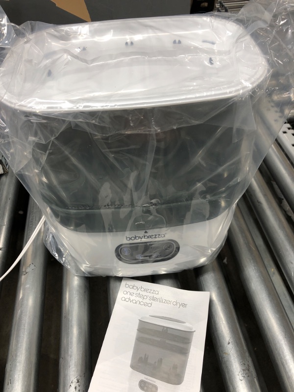 Photo 1 of Baby Brezza Baby Bottle Sterilizer and Dryer Advanced – Electric Steam Sterilization Machine – Universal Sterilizing for All Bottles: Plastic + Glass + Pacifiers + Breast Pump Parts - HEPA Filtration