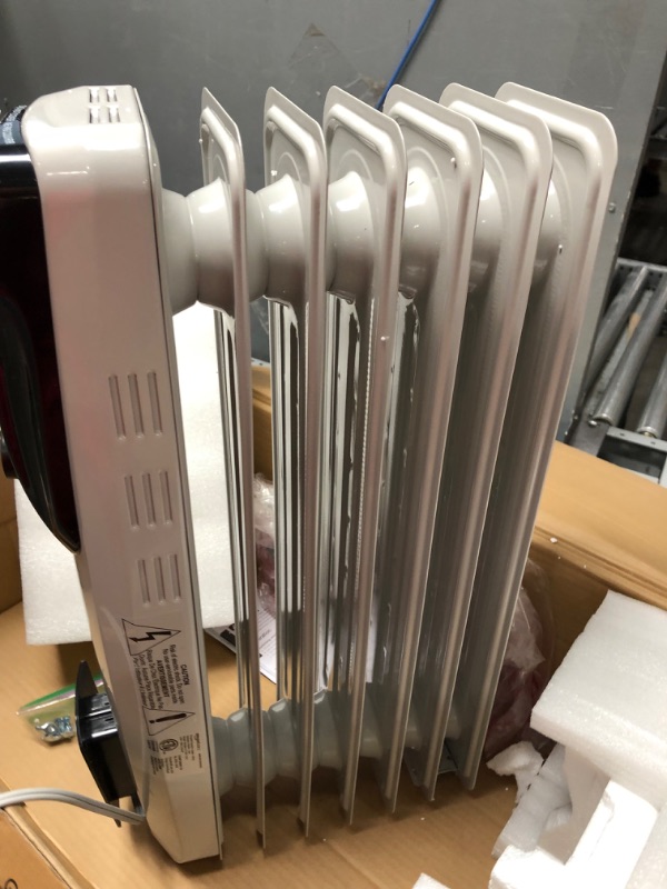 Photo 2 of ***NON-FUNCTIONAL*****   Amazon Basics Indoor Portable Radiator Heater - White White Heater
