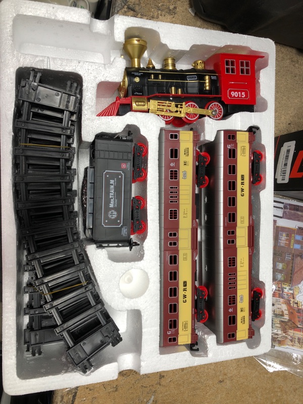 Photo 2 of TEMI Train Set with Steam Locomotive Engine, Cargo Car and Long Track for Toddlers 3-5, Rechargeable Battery Operated Play Train Toys with Smoke, Light & Sounds, Gift for Kids, Boys & Girls 4-7 Years Red