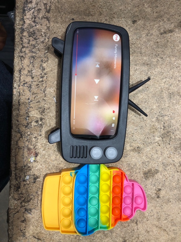 Photo 1 of 10 assorted items, teething helper, headband, fidget toy, dream bella, clothe plastic clip holders, and misc