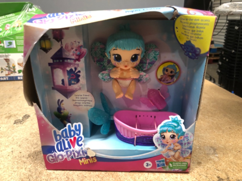 Photo 2 of Baby Alive GloPixies Minis Doll Aqua Flutter Glow-in-the-Dark Pixie Doll
