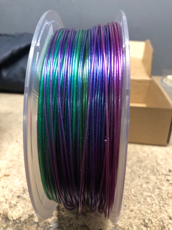 Photo 3 of LOCYFENS Rainbow PLA Filament 1.75mm, 3D Printer Filament Multicolor PLA Filament, Color Change Shiny PLA Filament 1.75mm, 3D Printing Filament 1kg/2.2lb Shiny Rainbow