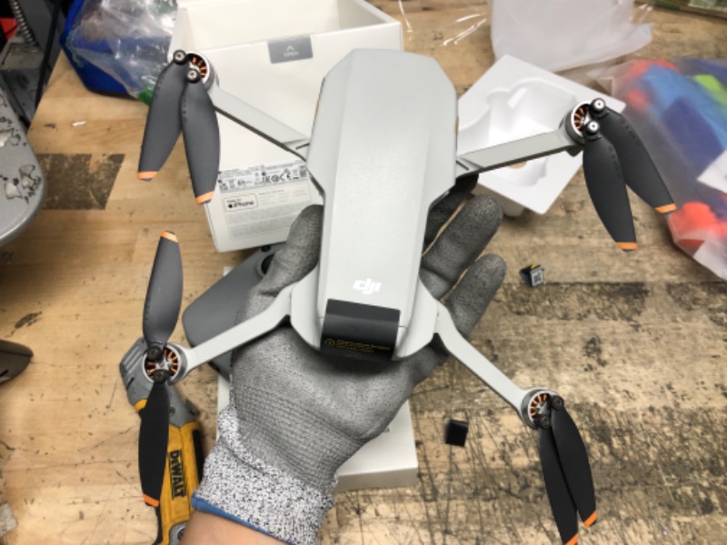 Photo 10 of **NEW, OPENED TO VERIFY CONTENTS**
DJI Mini 2 – Ultralight and Foldable Drone Quadcopter, 3-Axis Gimbal with 4K Camera, 12MP Photo, 31 Mins Flight Time, OcuSync 2.0 10km HD Video Transmission, QuickShots Gray