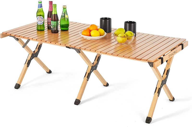 Photo 1 of  NEW. HAORUI Portable Picnic Table,Travel Camping Folding Table, Adjustable Height Cake Roll Beech Wooden Table with Storage Bag for Picnic BBQ, Camping, Travel, Beach, Patio, Backyard
