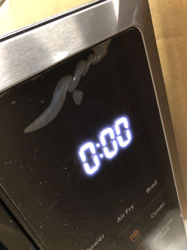 Photo 1 of TOSHIBA ML2-EC10SA(BS) 8-in-1 Countertop Microwave with Air Fryer Microwave Combo, Convection, Broil, Odor removal, Mute Function, 12.4" Position Memory Turntable with 1.0 Cu.ft, Black stainless steel Air Fry-1.0 Cu.Ft.