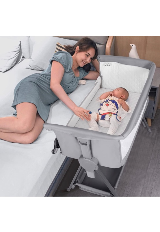 Photo 1 of Cowiewie Baby Bassinet with Bed Mattress and Storage | 7-Levels Height Adjustable | Basket Beside Bassinet Sleeper Impact Cotton Protects Baby's Head and Feet