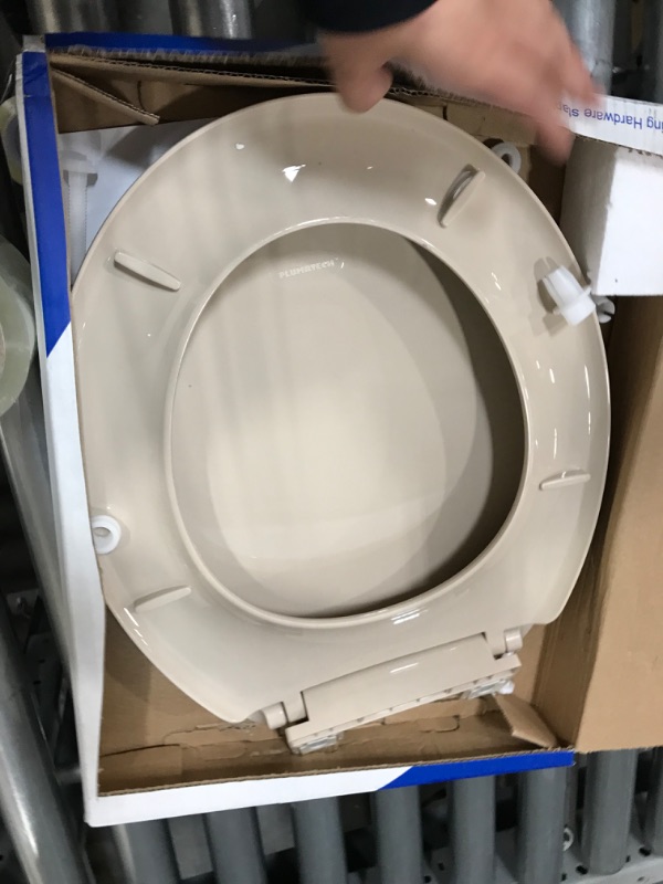 Photo 4 of  Close Plastic Toilet Seat 