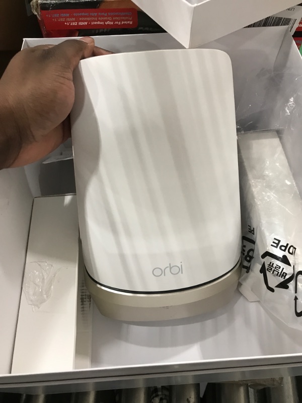 Photo 4 of **SEE NOTES**
NETGEAR Orbi Quad-Band WiFi 6E Mesh System (RBKE963), Router with 2 Satellite Extenders, Coverage up to 9,000 sq. ft, 200 Devices, 10 Gig Internet Port, AXE11000 802.11 Axe (Up to 10.8Gbps) WiFi 6E | 