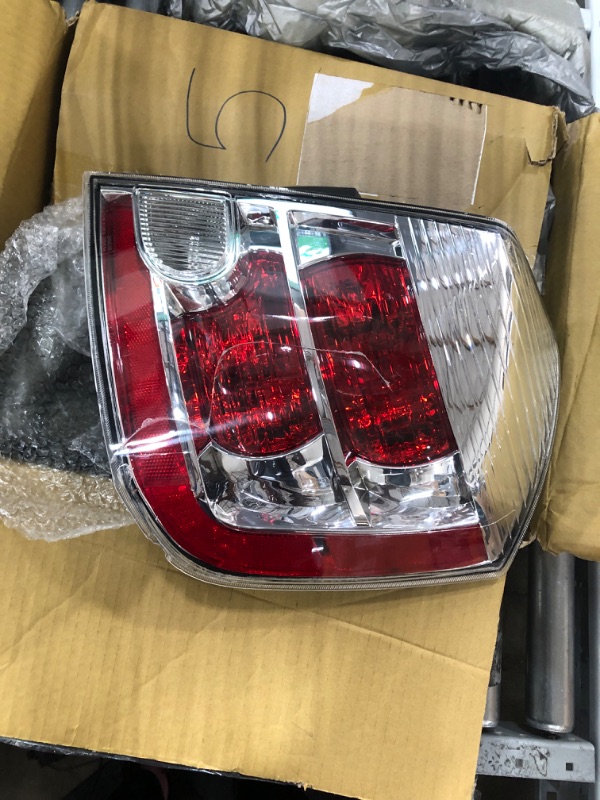 Photo 2 of Dorman 1611377 Passenger Side Tail Light Assembly Compatible with Select Nissan Models