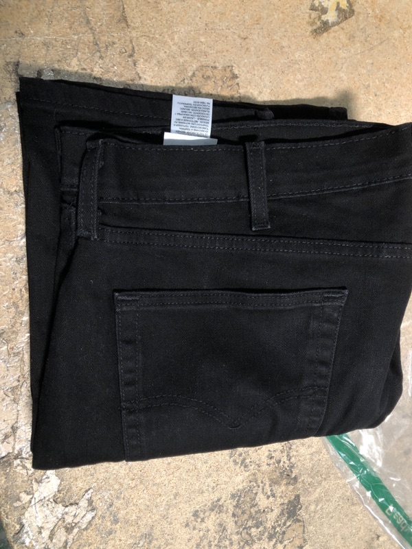 Photo 1 of 42 X 30 " BLACK LEVIS PANTS 