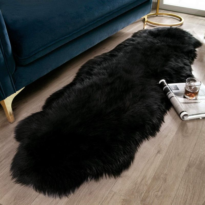 Photo 1 of *COLOR MAY VARY* ITSOFT Premium Soft Faux Fur Area Rug for Bedroom, Living Room, Chair Couch Cover, Bedside Plush Carpet Floor Mat, 2 x 6 Feet Sheepskin Shape, Frosted Tips Black