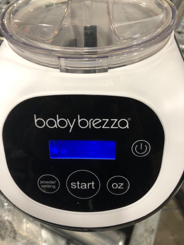 Photo 3 of Baby Brezza Formula Pro Mini Baby Formula Maker – Small Baby Formula Mixer Machine Fits Small Spaces and is Portable for Travel– Bottle Makers Makes The Perfect Bottle for Your Infant On The Go Formula Pro Mini Dispenser Machine