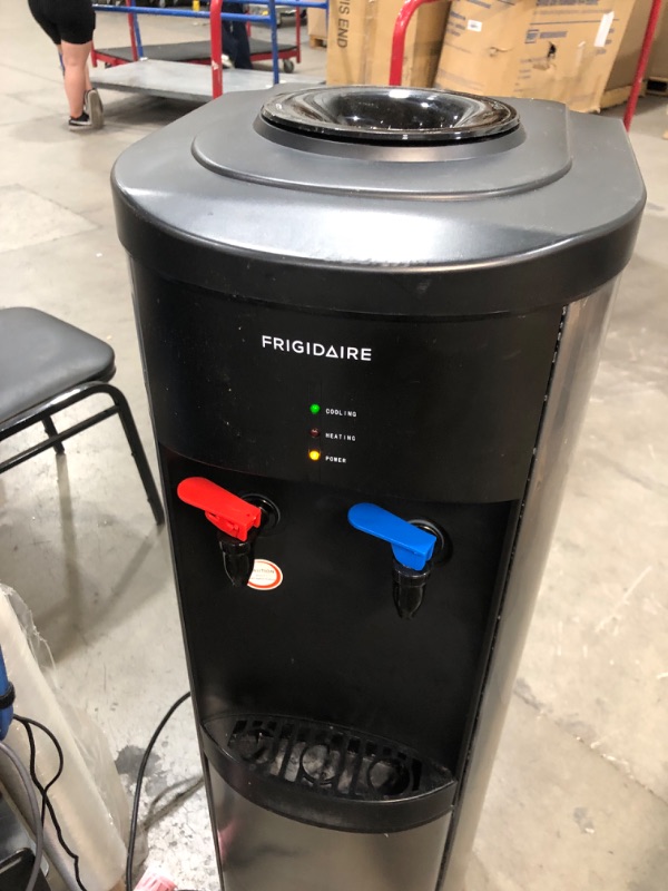 Photo 2 of **** POWERS ON - NOT ABLE  TO FULLY TEST *** Frigidaire EFWC519 Stainless Steel Water Cooler/Dispenser, standard, Stainless Stainless TOP-LOAD Cooler