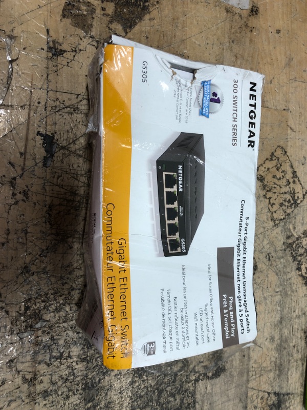 Photo 2 of NETGEAR 5-Port Gigabit Ethernet Unmanaged Switch (GS305) - Home Network Hub, Office Ethernet Splitter, Plug-and-Play, Silent Operation, Desktop or Wall Mount 5 Port