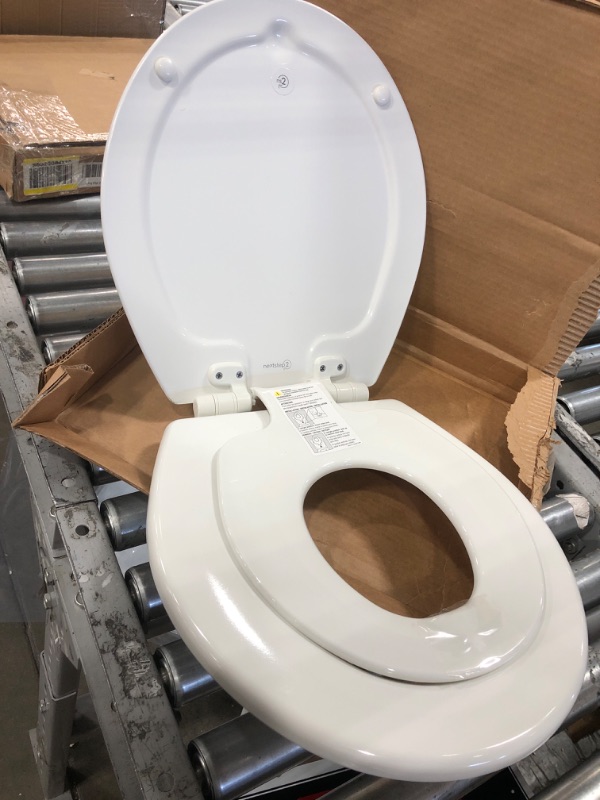 Photo 2 of **MISSING HARDWARE** MAYFAIR 888SLOW 000 NextStep2 Toilet Seat with Built-In Potty Training Seat, Slow-Close, Removable that will Never Loosen, ROUND, White Round White