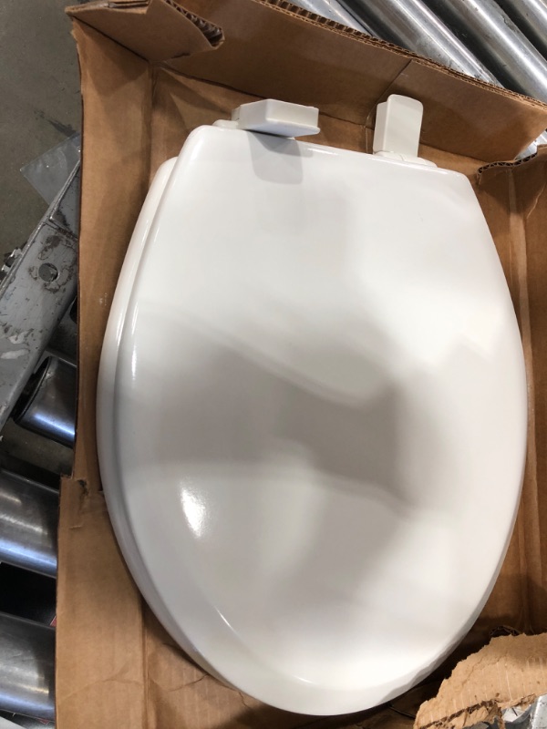 Photo 3 of **MISSING HARDWARE** MAYFAIR 888SLOW 000 NextStep2 Toilet Seat with Built-In Potty Training Seat, Slow-Close, Removable that will Never Loosen, ROUND, White Round White