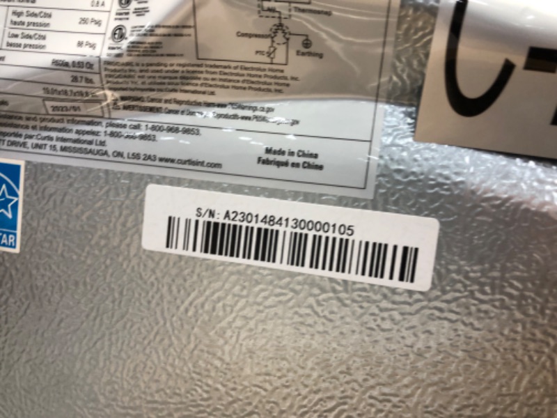 Photo 5 of **CENTER BACK OF FRIDGE IS DENTED BUT FRIDGE WORKS AND COOLS FAST**
FRIGIDAIRE Black EFR176- AMZ EFR176 Retro Mini Refrigerator-Energy Saving-Adjustable Thermostat Control-Side Mounted Bottle Opener-Ideal for Dorm, Office, RV, Garage, Apartment 1.6 Cubic 