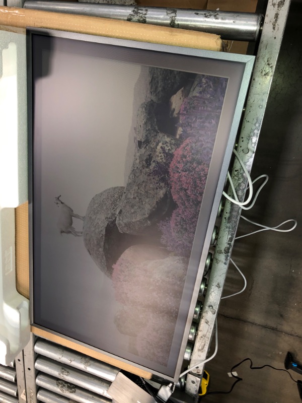 Photo 1 of SAMSUNG 32-Inch Class QLED 4K LS03B Series The Frame Quantum HDR Smart TV & SAMSUNG 32-inch Class The Frame Customizable Bezel 32-Inch TV w/ Beige Bezel