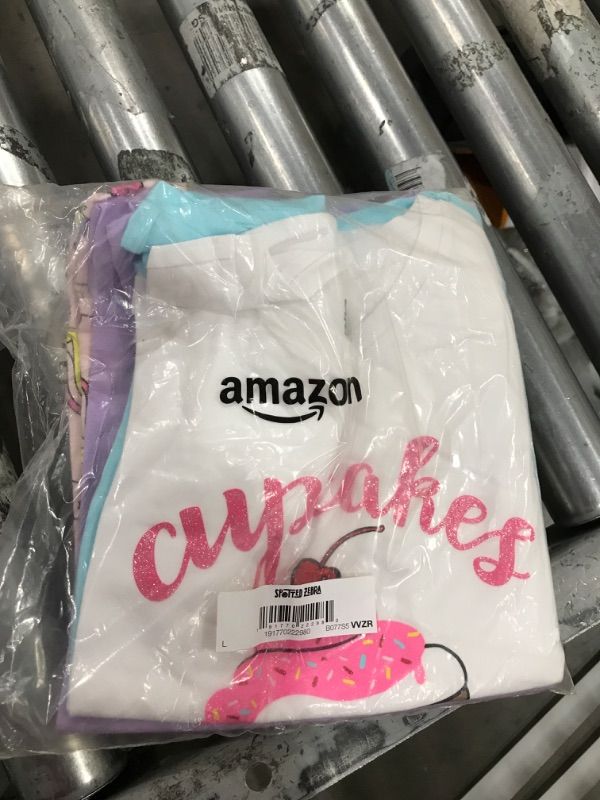 Photo 2 of Amazon Essentials Girls and Toddlers' Short-Sleeve T-Shirt Tops (Previously Spotted Zebra), Multipacks 4 Purple/Blue/White, Cupcake/Unicorn Large