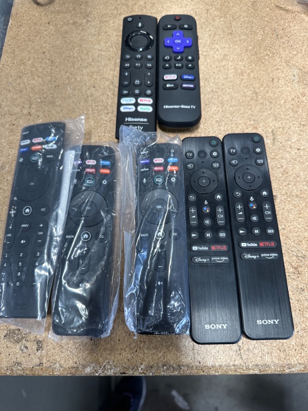 Photo 1 of Bundle of assorted remotes. 2 Sony, 3 Vizio, and 2 Hisense. total of 7 remotes