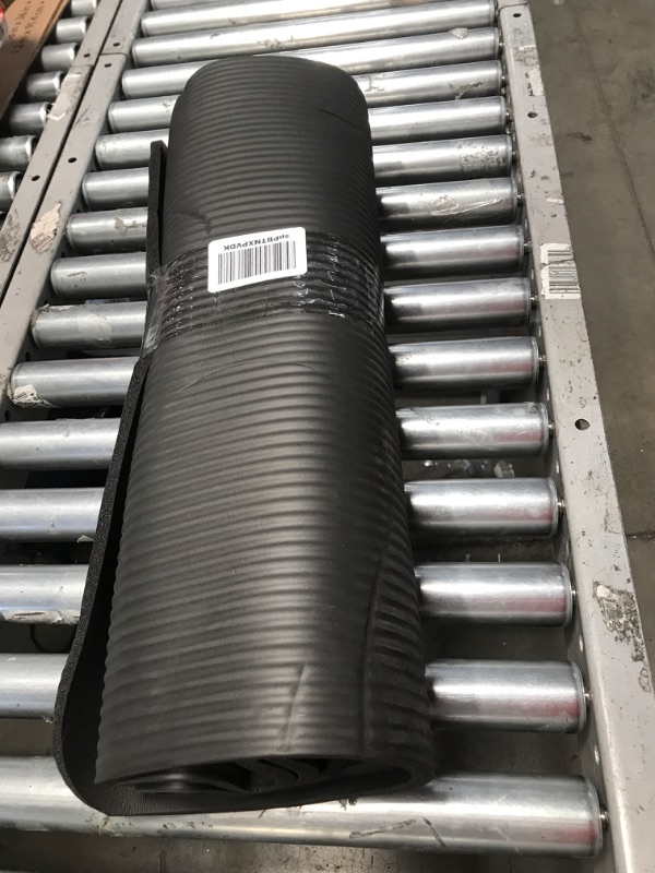 Photo 2 of Amazon Basics Extra Thick Exercise Yoga Gym Floor Mat with Carrying Strap - 74 x 24 x .5 Inches, Black & High-Density Round Foam Roller for Exercise and Recovery - 36 Inch, Black