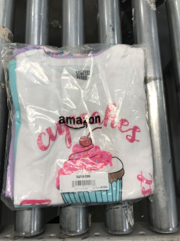 Photo 2 of Amazon Essentials Girls and Toddlers' Short-Sleeve T-Shirt Tops (Previously Spotted Zebra), Multipacks 4 Purple/Blue/White, Cupcake/Unicorn Small