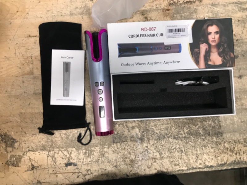 Photo 1 of **SEE NOTES**
Fezax Cordless Auto Hair Curler, Automatic Curling Iron with LCD Display Adjustable Temperature & Timer, Portable