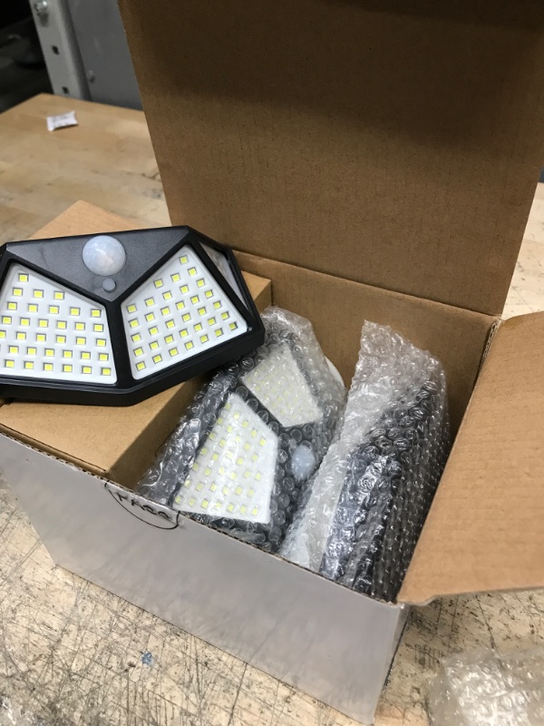 Photo 2 of 
4 Pack Solar Lights Outdoor, Motion Sensor Solar Lights with 100 LED, Wireless Wall Lights, , 3 Lighting Modes and IP65 Waterproofed for Wall, Patio, Garden...
