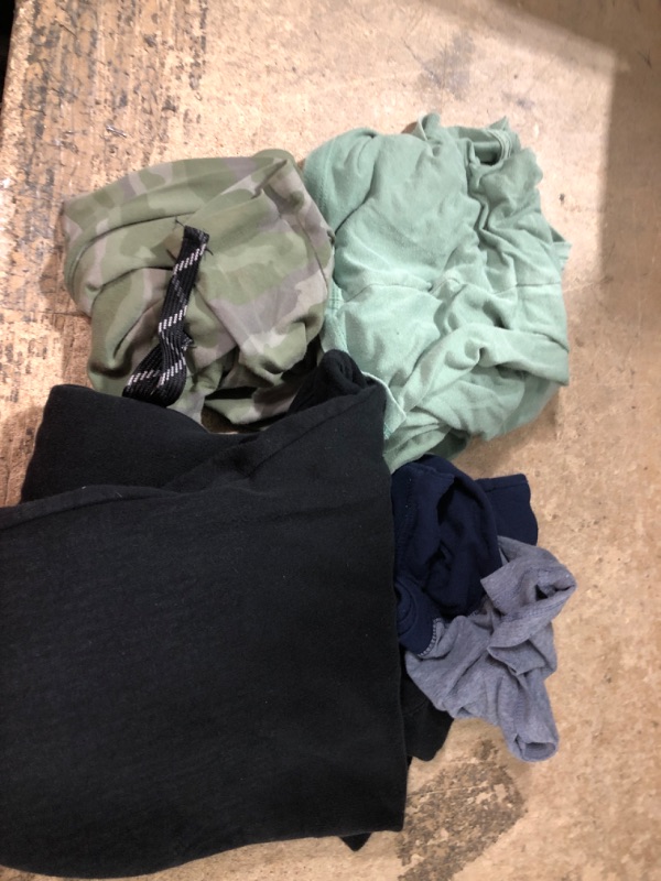 Photo 1 of 10 assorted clothing items shirts, pants, shorts