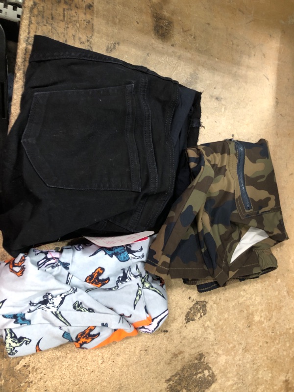 Photo 1 of 10 assorted clothing items xxl black shorts, kids pajama, and babies shirts