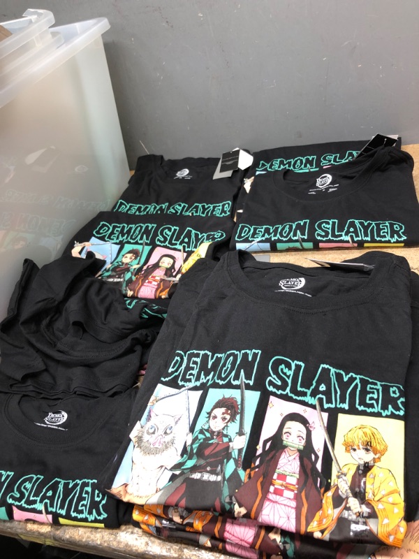 Photo 1 of BUNDLE OF 15 ASSORTED DEMON SLAYER T-SHIRTS - SIZES XS-XXL 