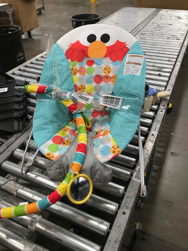 Photo 2 of Bright Starts Sesame Street I Spot Elmo! 3-Point Harness Vibrating Baby Bouncer with Toy bar
