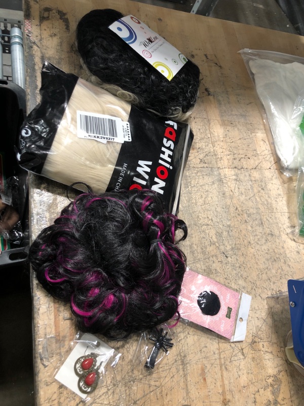 Photo 1 of ***Bundle of wigs black/blonde/purple/ - 3 pack 