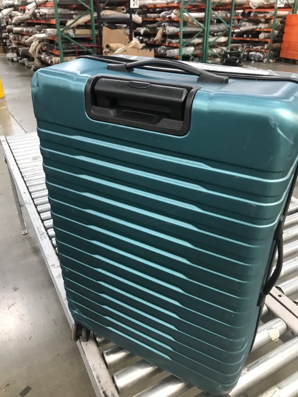 Photo 5 of *** used has minor hole see pictures *** U.S. Traveler Boren Polycarbonate Hardside Rugged Travel Suitcase Luggage with 8 Spinner Wheels, Aluminum Handle, Teal, Checked-Large 30-Inch
