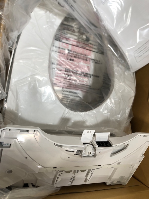 Photo 2 of ***PARTS ONLY DOES NOT OPERATE**** 
TOTO SW3084#01 WASHLET C5 Electronic Bidet Toilet Seat with PREMIST and EWATER+ Wand Cleaning, Elongated, Cotton White C5 Elongated Cotton White