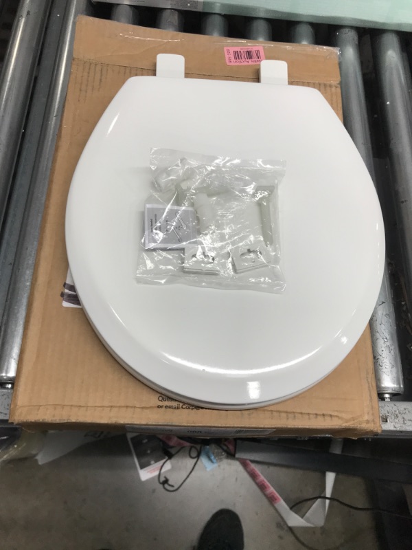 Photo 2 of ***USED**
MAYFAIR 888SLOW 000 NextStep2 Toilet Seat with Built-In Potty Training Seat, Slow-Close, Removable that will Never Loosen, ROUND, White Round White