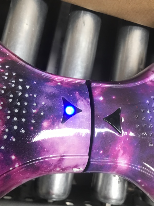 Photo 1 of Hover-1 Helix Electric Hoverboard | 7MPH Top Speed, 4 Mile Range, 6HR Full-Charge, Built-in Bluetooth Speaker, Rider Modes: Beginner to Expert Hoverboard Galaxy