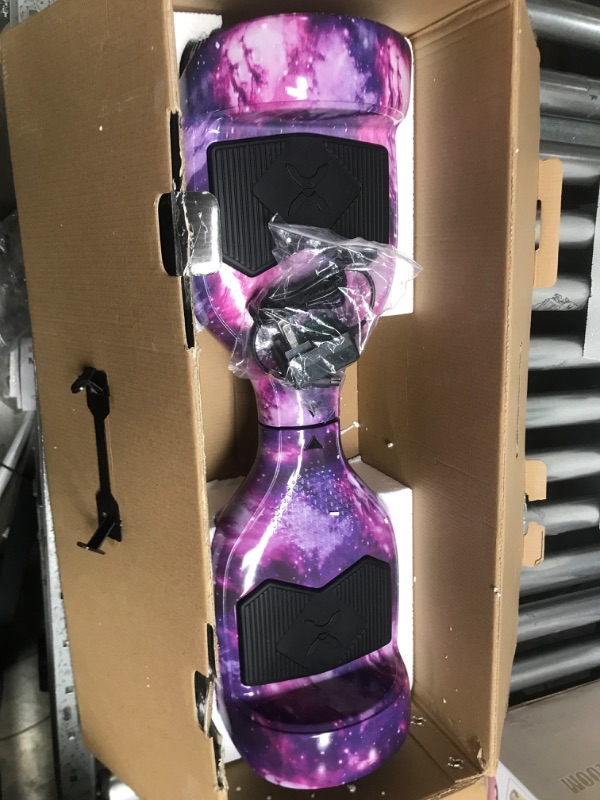Photo 1 of Hover-1 Helix Electric Hoverboard | 7MPH Top Speed, 4 Mile Range, 6HR Full-Charge, Built-in Bluetooth Speaker, Rider Modes: Beginner to Expert Hoverboard Galaxy