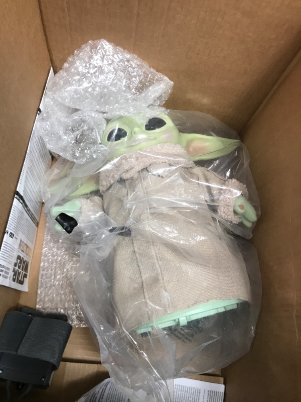 Photo 1 of Baby yoda toy