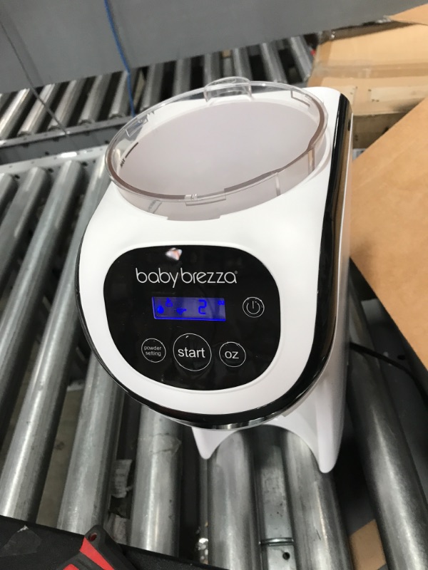 Photo 4 of Baby Brezza Formula Pro Mini Baby Formula Maker – Small Baby Formula Mixer Machine Fits Small Spaces and is Portable for Travel– Bottle Makers Makes The Perfect Bottle for Your Infant On The Go Formula Pro Mini Dispenser Machine