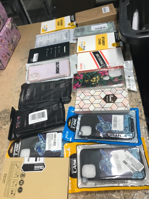 Photo 1 of Bundle of assorted phone cases/screen protectors/cases etc. -16