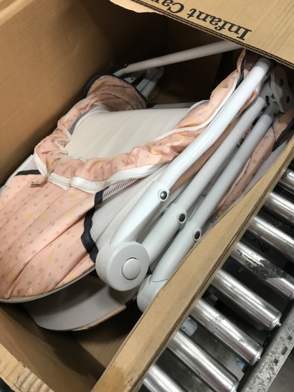 Photo 1 of Dream On Me Karley Plus Portable Quick Fold Bassinet with Removable Canopy in Blush Pink