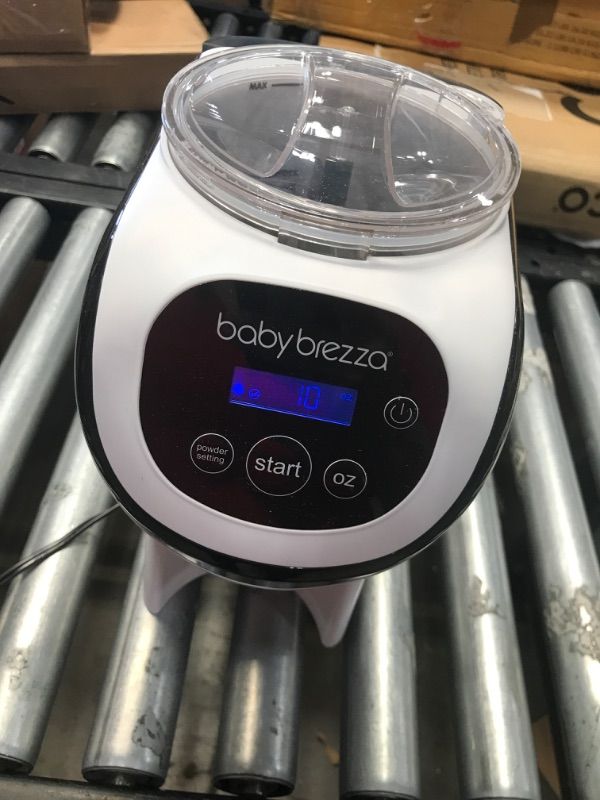 Photo 2 of Baby Brezza Formula Pro Mini Baby Formula Maker – Small Baby Formula Mixer Machine Fits Small Spaces and is Portable for Travel– Bottle Makers Makes The Perfect Bottle for Your Infant On The Go Formula Pro Mini Dispenser Machine