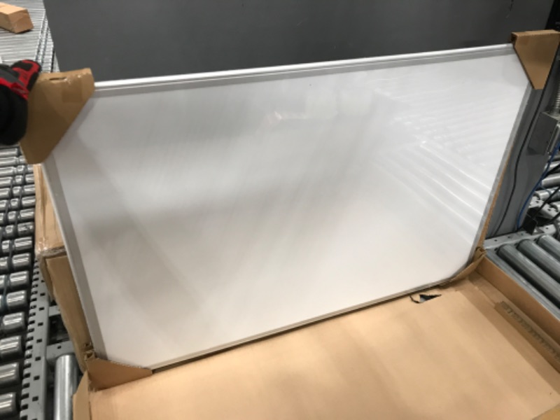 Photo 1 of **MINOR DAMAGE**Amazon Basics Magnetic Dry Erase White Board, 36 x 24-Inch Whiteboard - Silver Aluminum Frame 24" x 36" Magnetic, Aluminum Frame