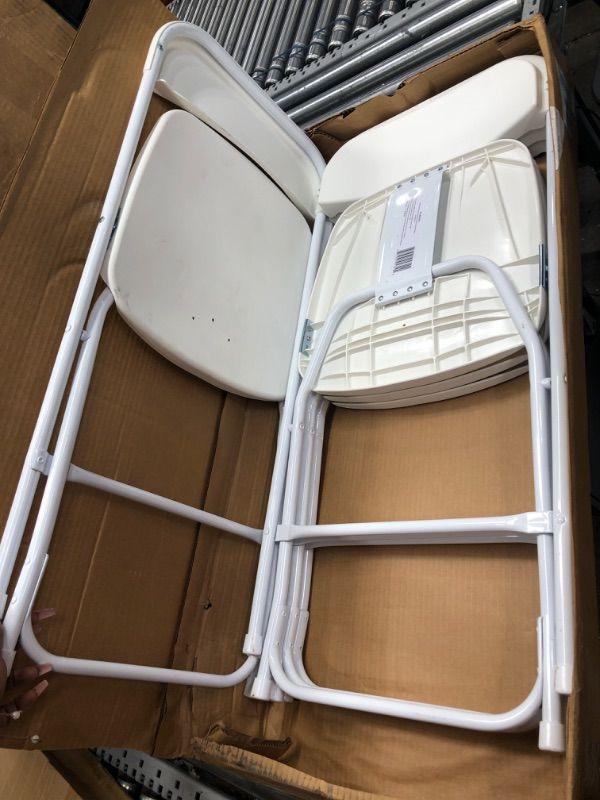 Photo 1 of Plastic Folding Chair, 800 lbs. Capacity, White - 4 CHAIRS